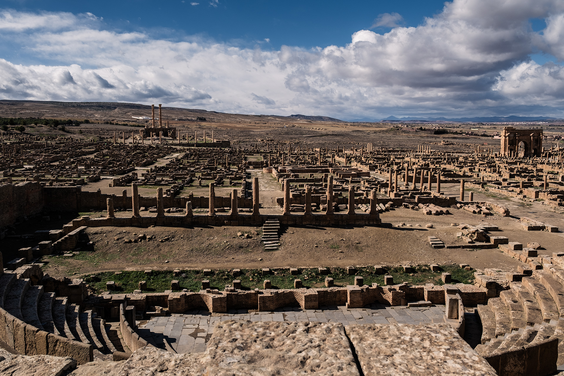 Ancient Roman ruins of Timgad in Algeria with columns and stone streets