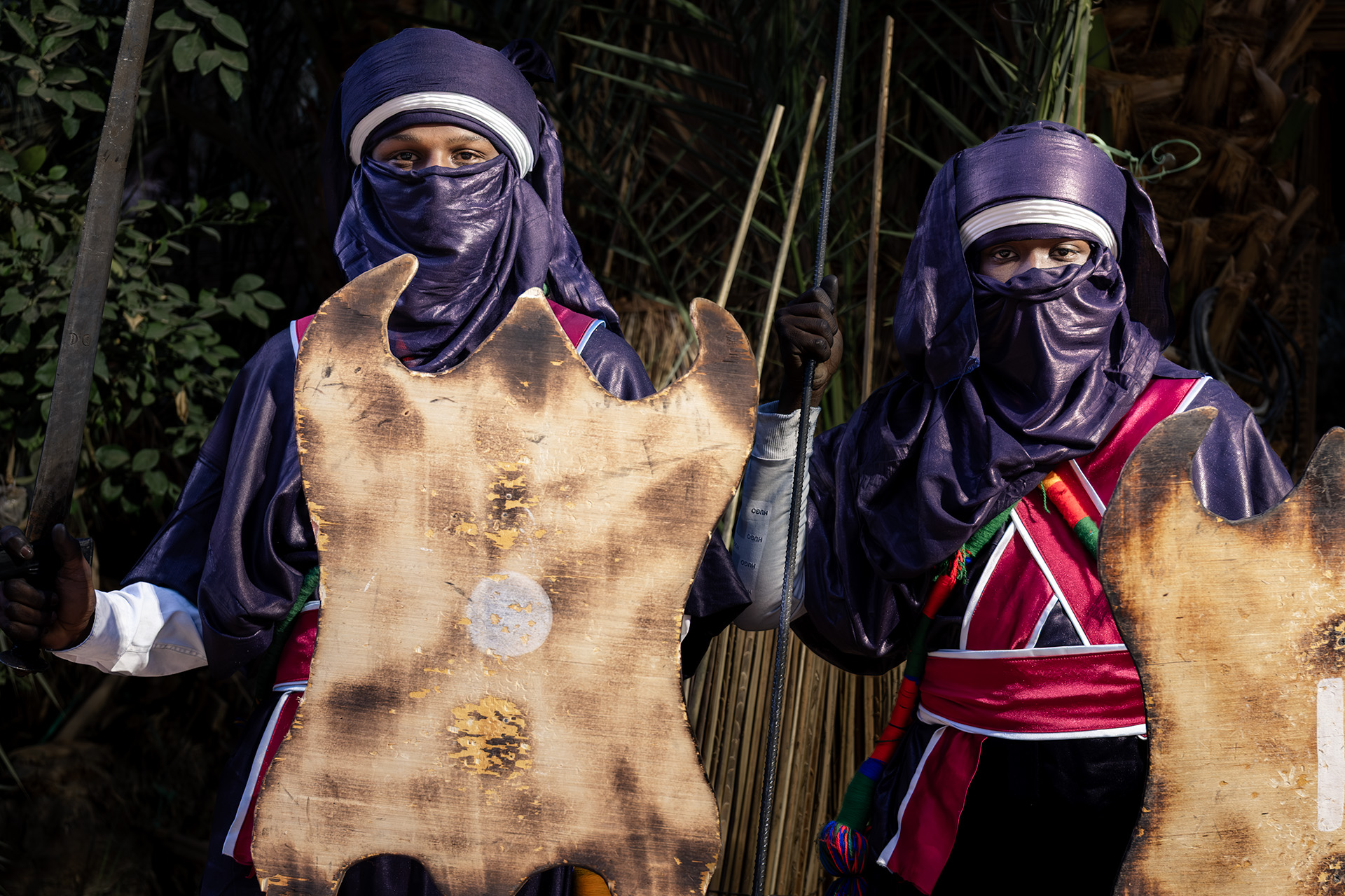 Tuareg man in traditional attire during cultural performance in the Algerian Sahara Djanet